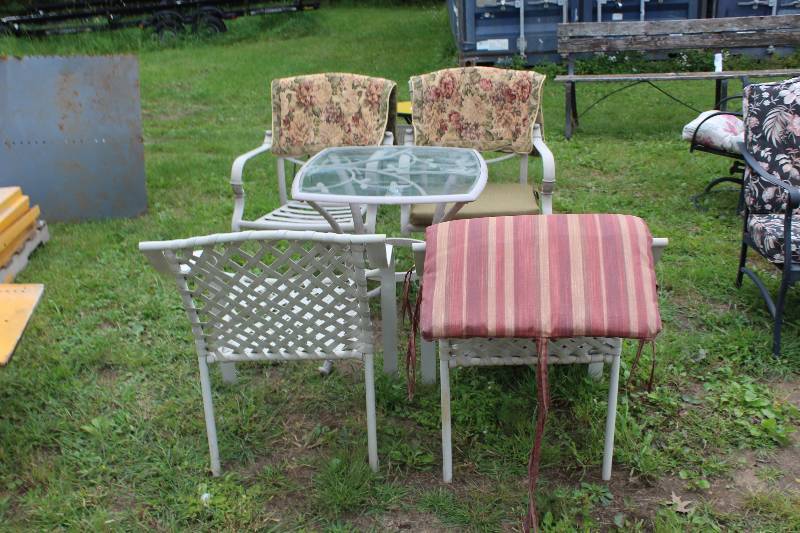 lot 83 image: Lot of (5) Patio Set Includes Glass Top Table, 4-Chairs