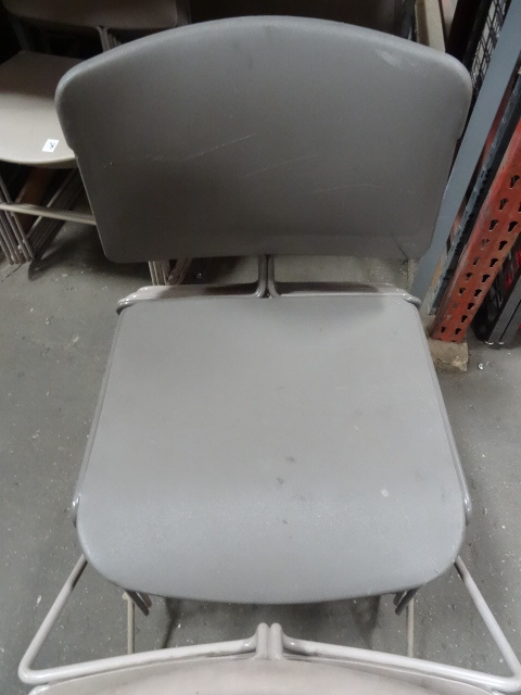 8 Metal Framed Stack Chairs