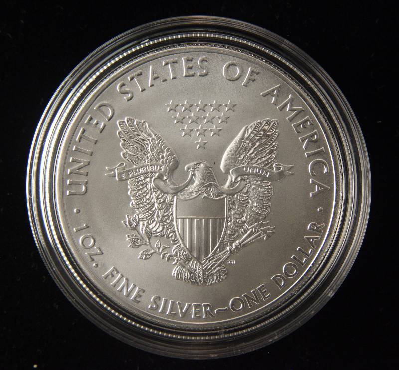 lot 54 image: 2013 AMERICAN SILVER EAGLE 1 TROY OZ. .999 FINE SILVER DOLLAR IN AIRTITE CAPSULE