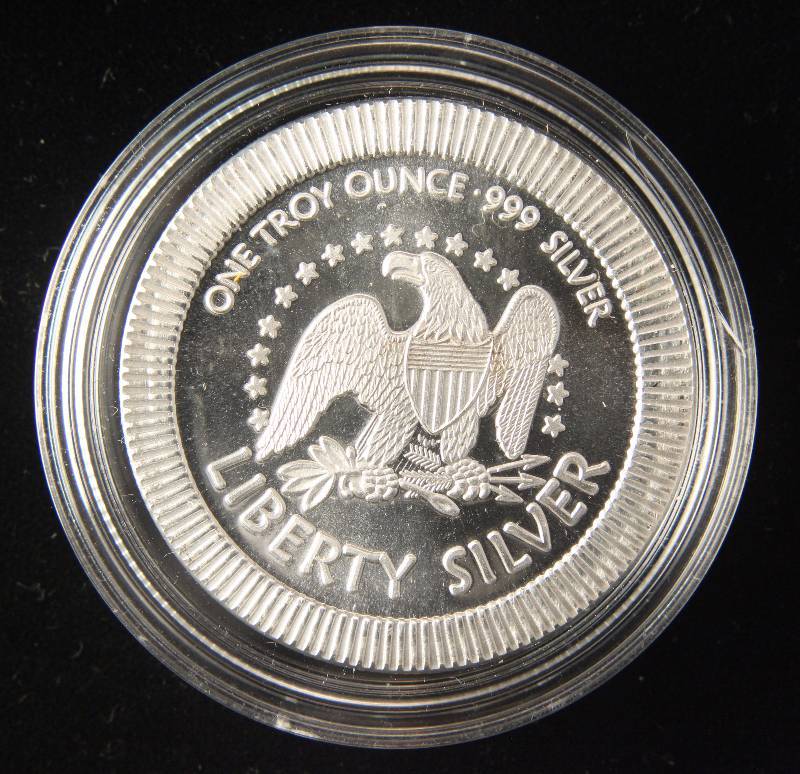 lot 60 image: 1 TROY OZ. .999 FINE SILVER LIBERTY SILVER IN AIRTITE HOLDER