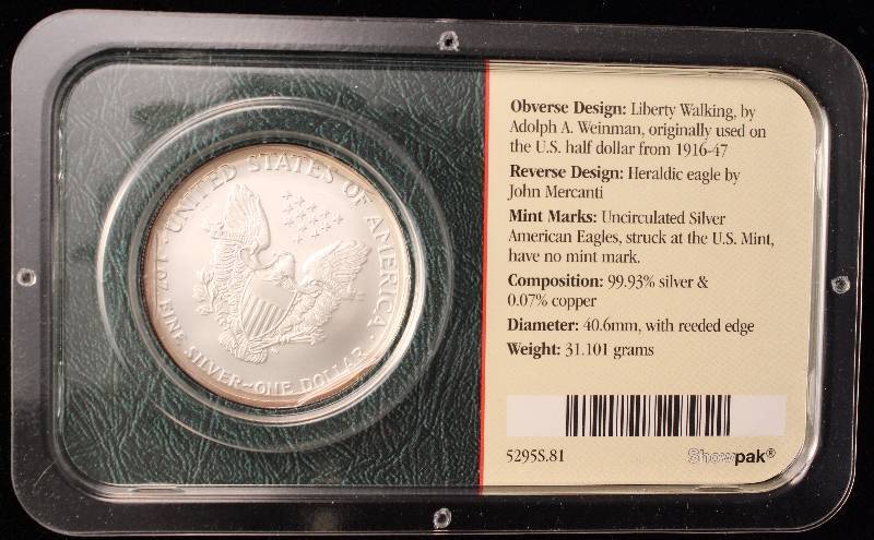 lot 83 image: 2005 AMERICAN SILVER EAGLE 1 TROY OZ. .999 FINE SILVER IN LITTLETON CASE