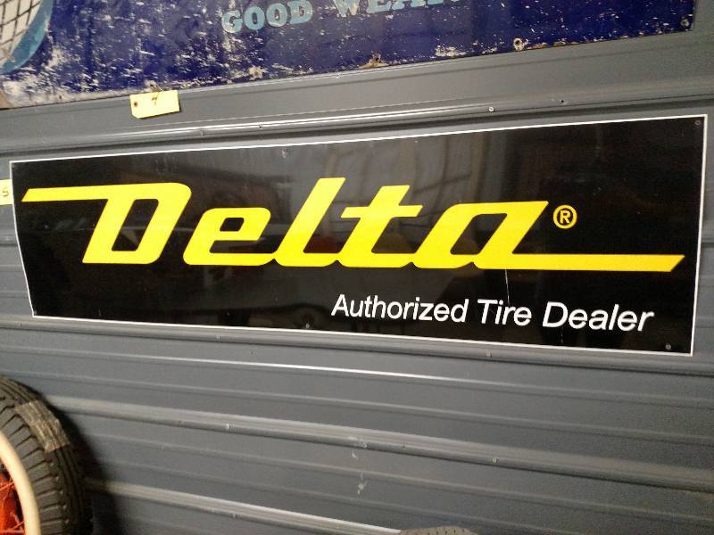 lot 5 image: Delta Tires Tin Sign, 60x16...