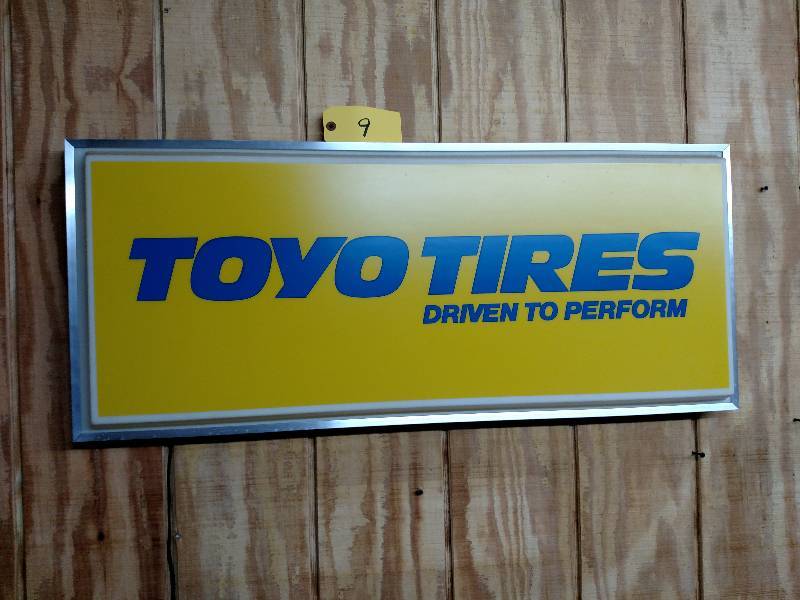 lot 9 image: Toyo Tires Back Lit Sign, 38x16...