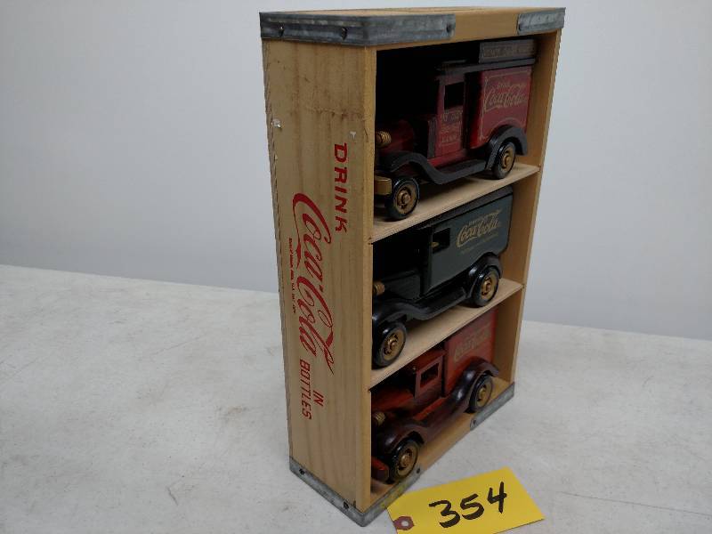 lot 354 image: (3) Coca-Cola Wooden Trucks in Coca...