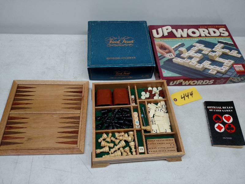 lot 444 image: (3) Games & (1) Book...