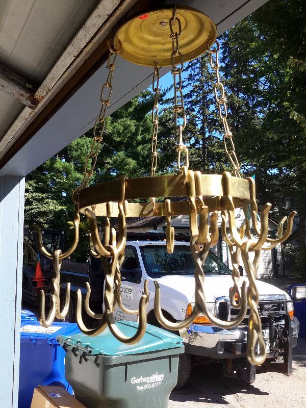Brass hanging system for pans