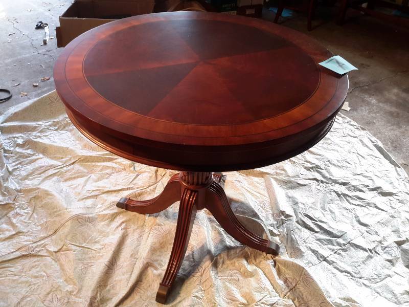 Beautiful Walnut Occasional Table.. Has beautifully carved base