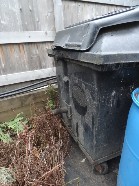Grease dumpster. 300-400 gal. On wh...