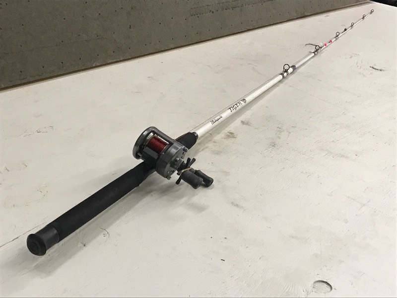 lot 14 image: Shakespeare Fishing Rod With Shimano Reel
