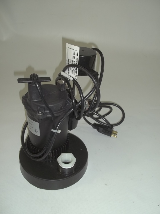 lot 26 image: Master Plumber submersible sump pump.  Consignor states never used