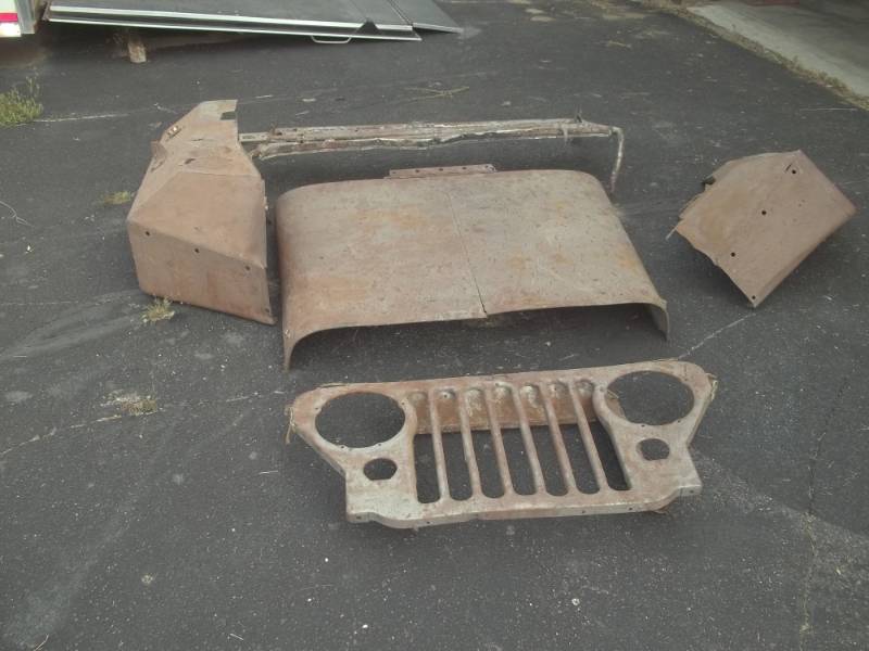 lot 39 image: Willis Jeep Parts includes Hood, 2 Fenders, Grill and Windshield Frame