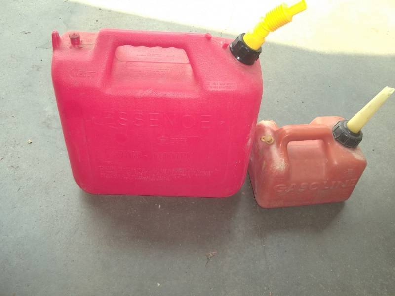 lot 67 image: Pair of Plastic Gas Cans