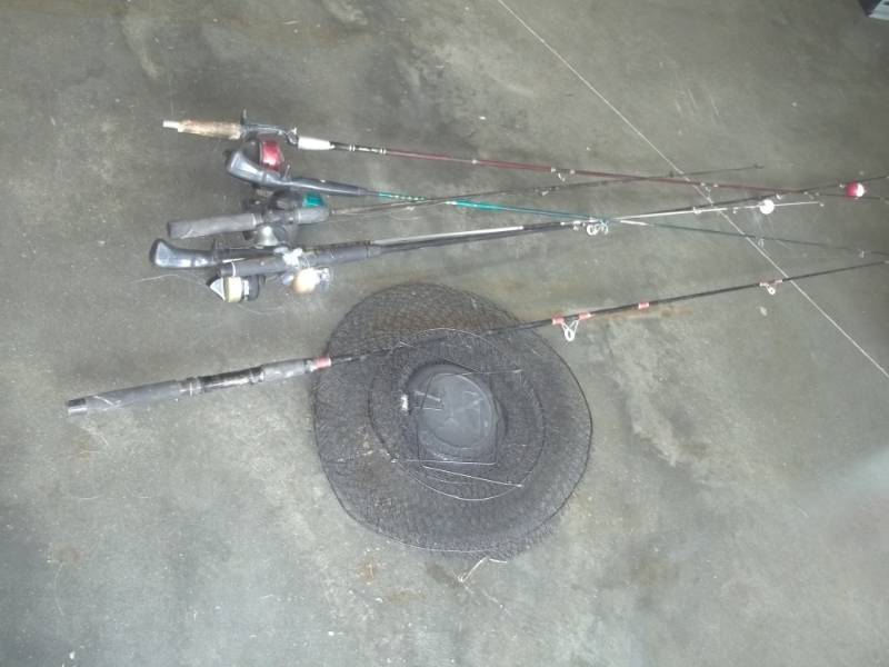 lot 73 image: Fish net with rods and Reels