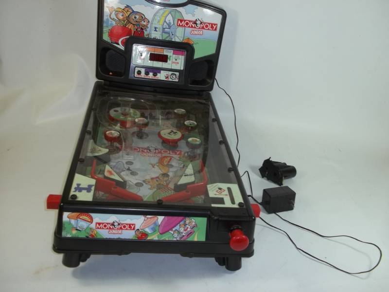 lot 109 image: Monopoly Junior Pinball one leg is broken and needs repair