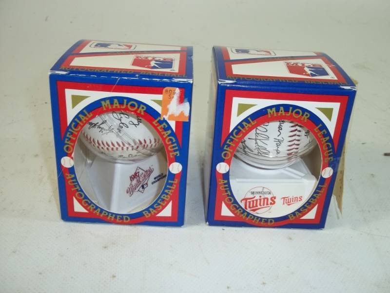 lot 157 image: Pair of Twins Autographed Baseballs 1987 1991