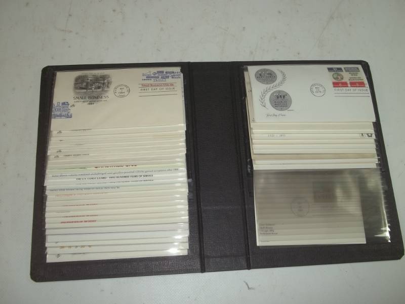lot 12 image: Book of First Issue Stamps