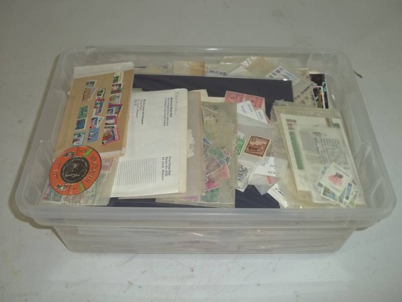 lot 14 image: 12 Quart Tote Full of Stamps