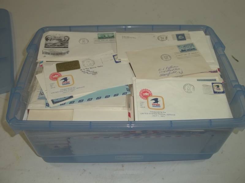 lot 15 image: 15 Quart Tote Full of Stamps including some first day Issue