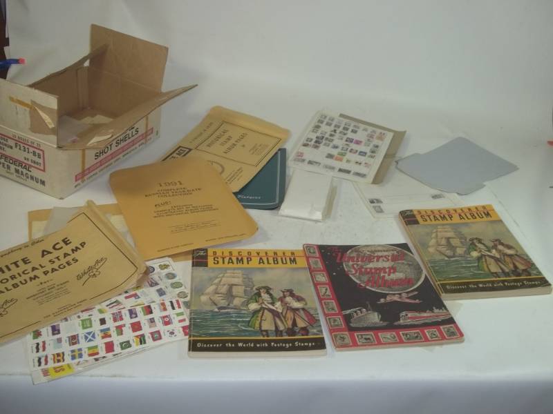 lot 229 image: Vintage stamp books with stamps and stamp supplies