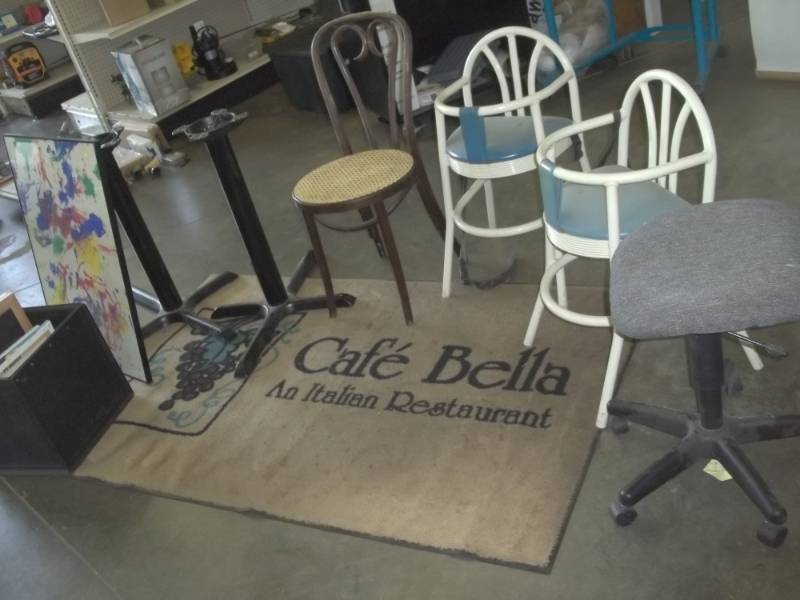 lot 275 image: Restaurant Dcor lot includes  2 table bases, Chair, 2 high Chairs, Rug and Framed prints
