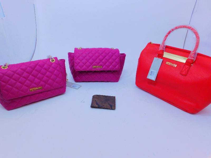 lot 33 image: New Kenneth Cole Reaction Purses