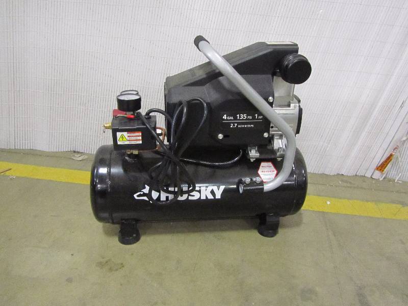 lot 5 image: Husky 4 Gal. Portable Electric-Powered Air Compressor