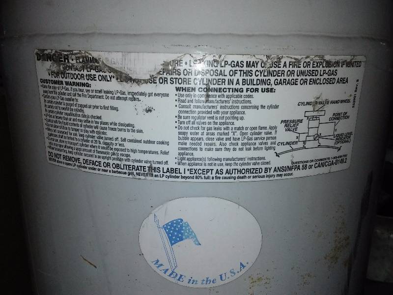 lot 119 image: quantity 2 - 100# tank, capacity 23 gallons LP tanks.