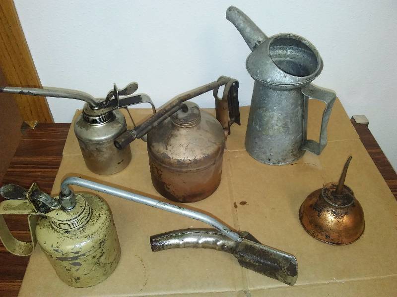 lot 4 image: Misc. Oil Cans and Spout (6)