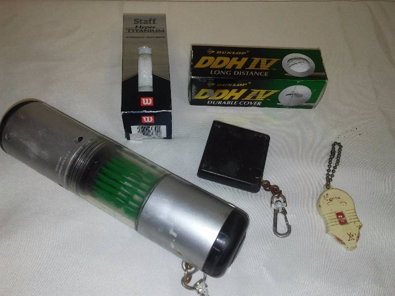lot 14 image: Vintage Golf Accessories and 6 new balls