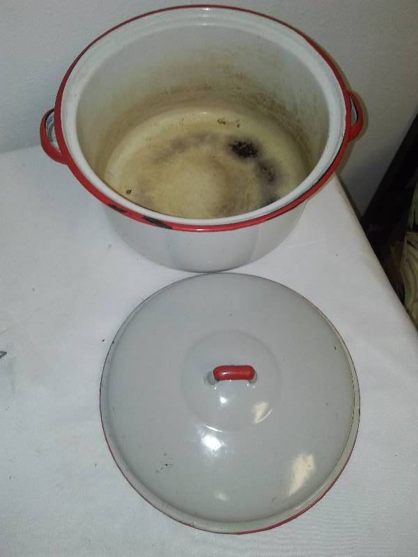 lot 41 image: Vintage Display lot, Enamelware, curling iron and egg beater with wood handles