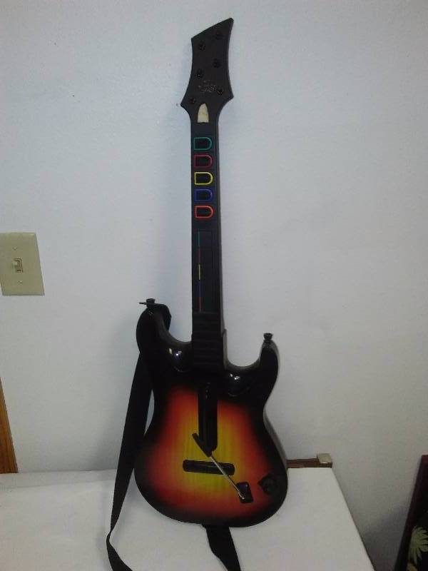 lot 61 image: Play Station 2 Guitar Hero Guitar, excellent condition by Red Octane