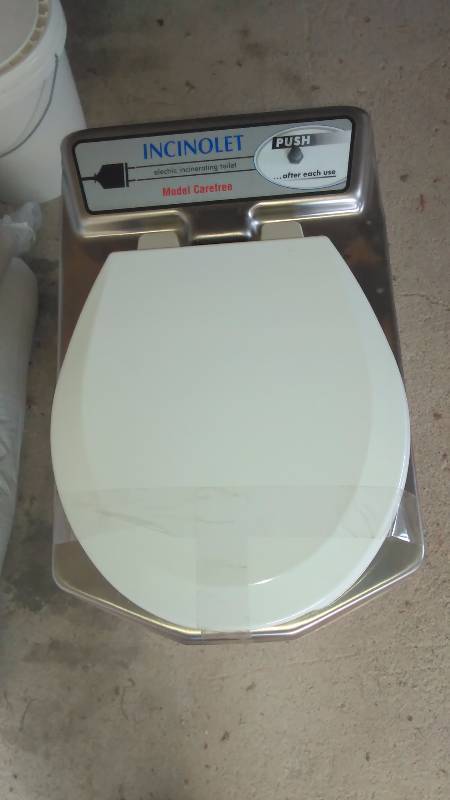 lot 120 image: INCINOLET CAREFREE DELUXE WATERLESS ELECTRIC TOILET
