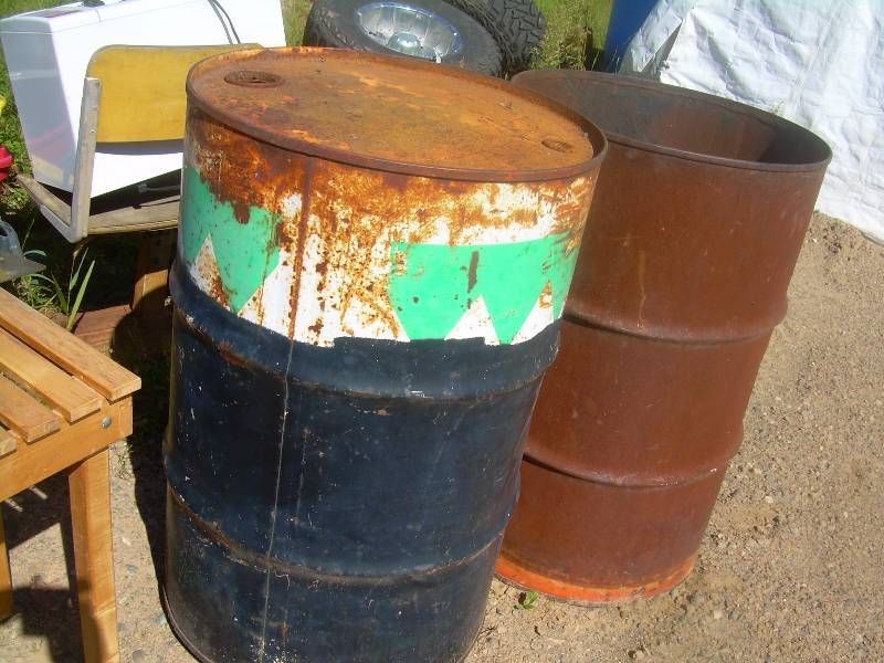 2 STEEL 50 GALLON BARRELS