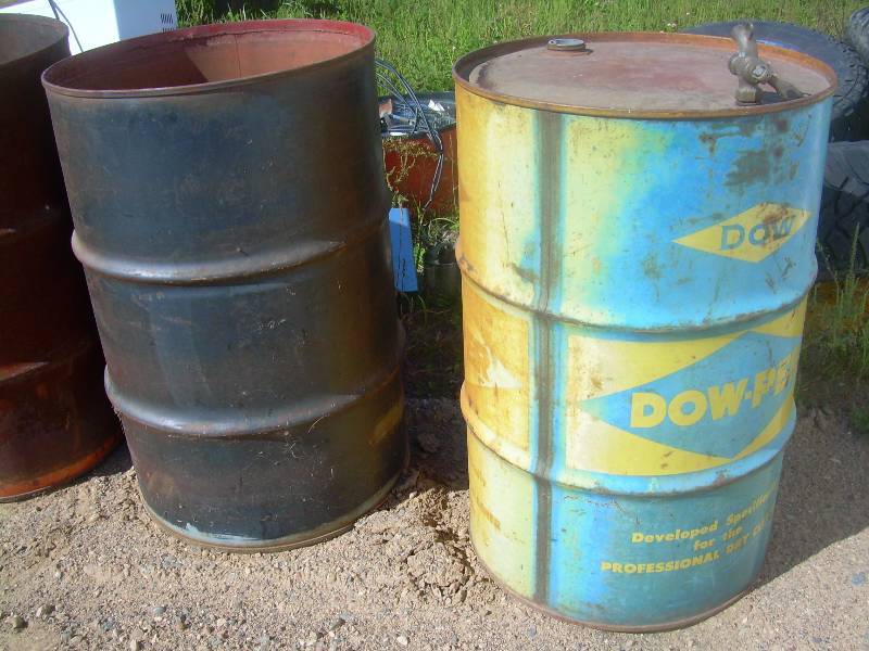 2 STEEL 50 GALLON BARRELS