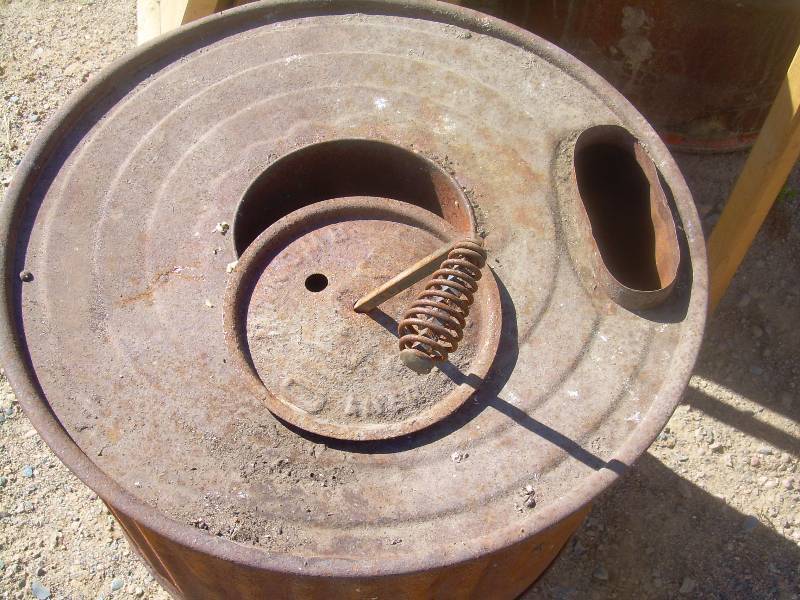 ANTIQUE METAL POT BELLY STOVE