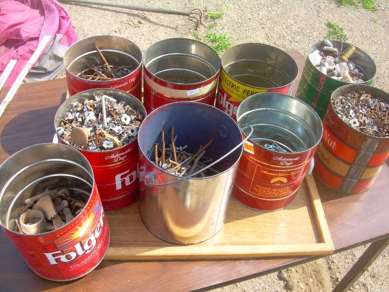 9 CANS OF NAILS , NUTS , SMALL CHAIN ETC