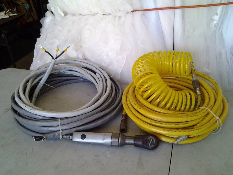 lot 16 image: Air Hose Coil, Air Ratchet, Large Coil Of Romex Wire 3 Conductor #8
