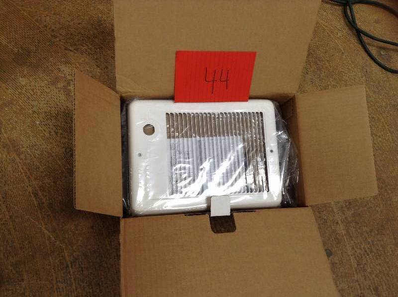 lot 44 image: Com-Pak 1,000-Watt 120-Volt Fan-Forced In-Wall Electric Heater in White Model # CSC101TW open box never used