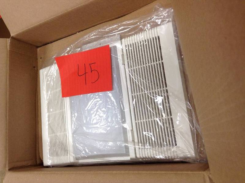 lot 45 image: Broan Deluxe Bath Heater with Light, White Model # 9960 open box never used
