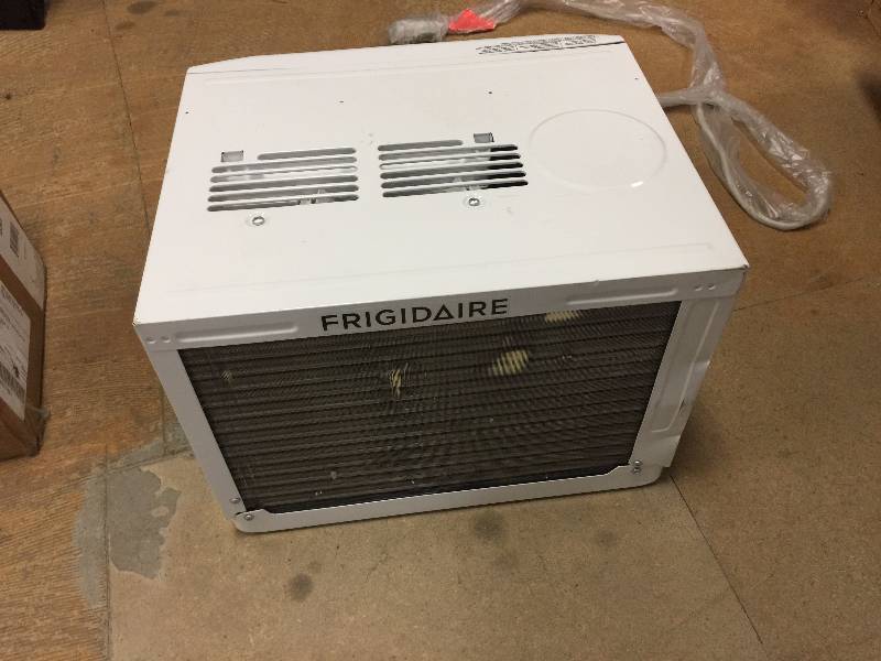 lot 119 image: Frigidaire 8,000 BTU Window-Mounted Slider small dents in working condition