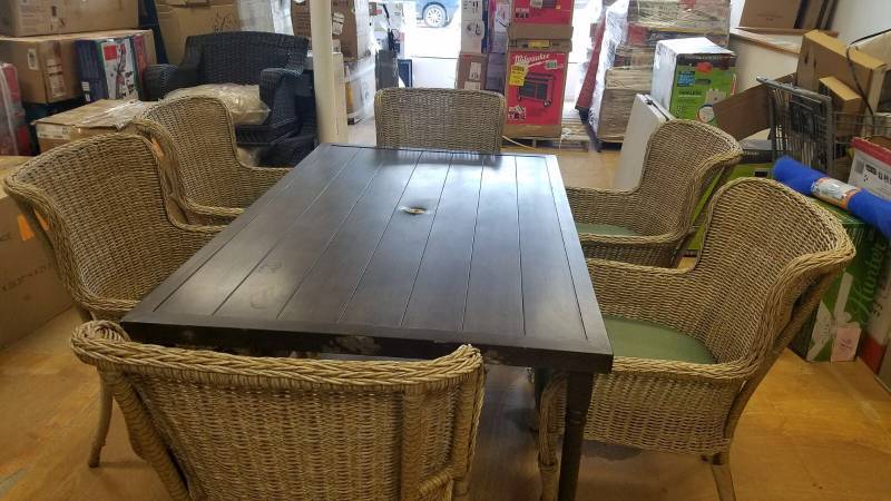 lot 166 image: Lemon Grove 7-Piece Wicker Outdoor Dining Set with Surplus Cushion damaged umbrella hole