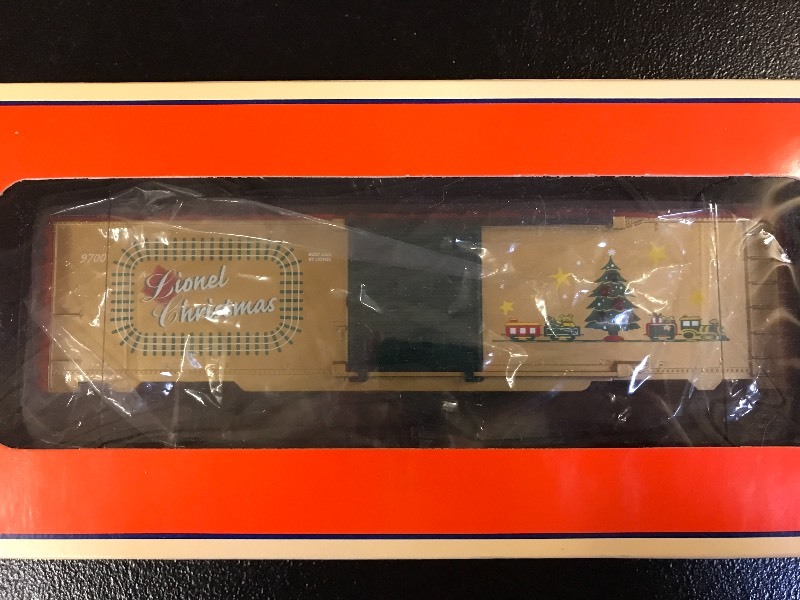 lot 323 image: LIONEL CHRISTMAS BOX CAR W LIGHTS