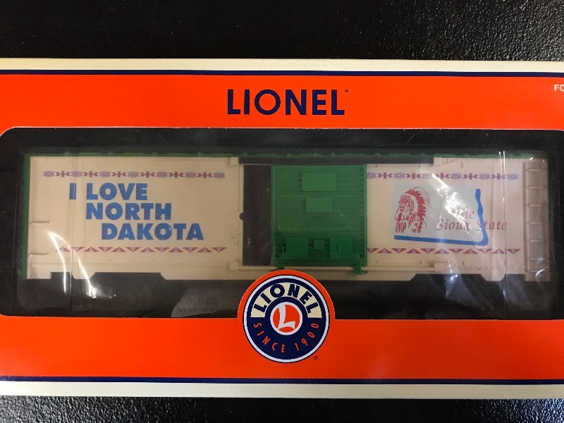 lot 333 image: LIONEL I LOVE NORTH DAKOTA BOXCAR