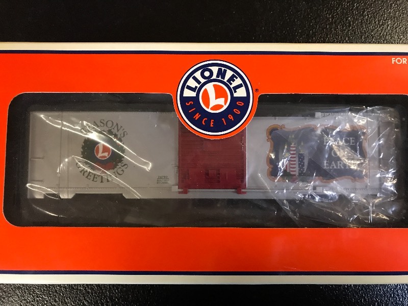 lot 340 image: LIONEL CHRISTMAS LIGHTED BOXCAR