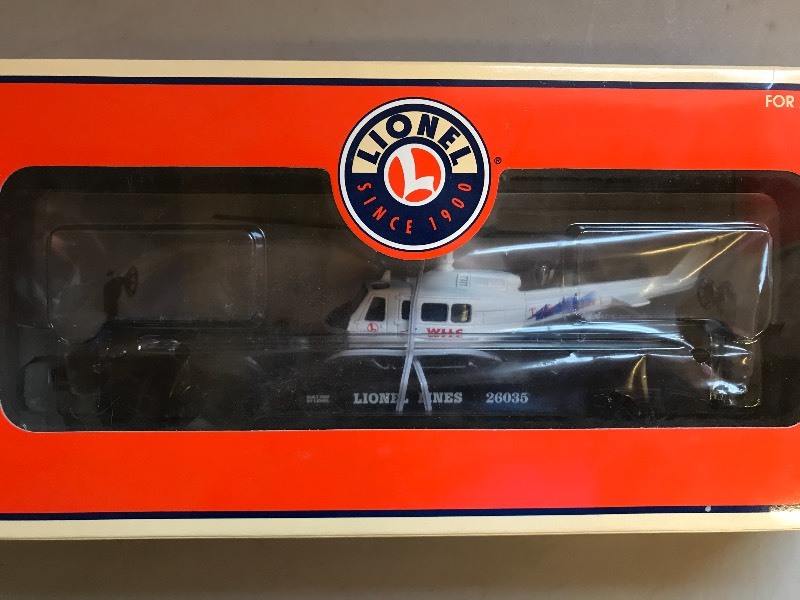 lot 406 image: LIONEL FLATCAR W WLLC HELICOPTER