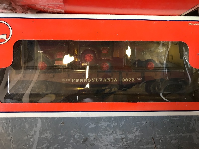 lot 100B image: LIONEL PENNSYLVANIA STANDARD FLAT CAR  TRUCKS