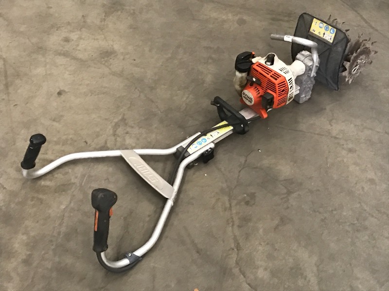 lot 13 image: Stihl MM55 Cultivator
