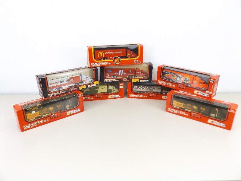 Lot of 8 NIB 164 Scale Racing Champions NASCAR Semi Trucks