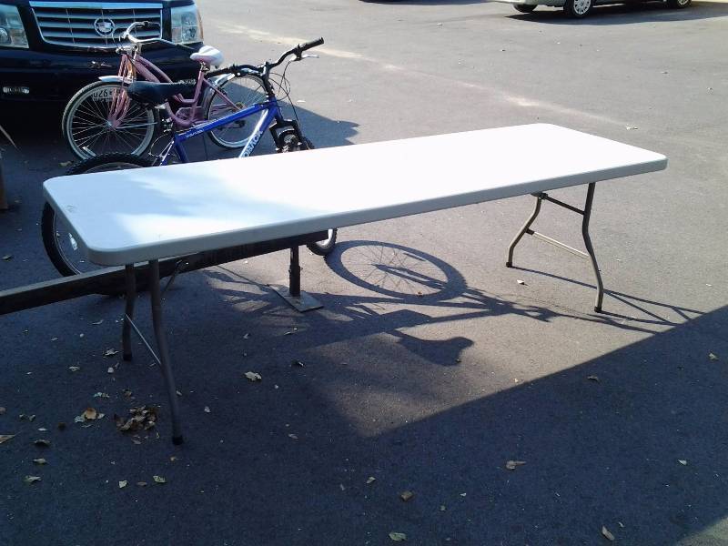 lot 51 image: Beige 8 Foot Folding Banquet Table
