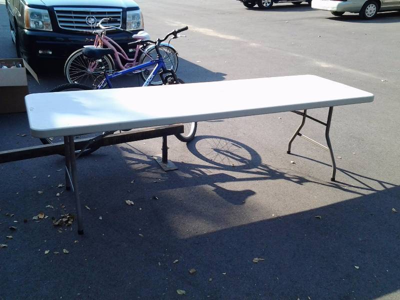 lot 52 image: Beige 8 Foot Folding Banquet Table